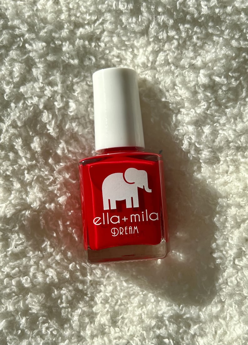 Ella+Mila Nail Polish in Unwrap Me from the Dream collection, a bright true red shade.